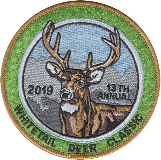 Whitetail Deer Classic 13th Annual patch from 2019, featuring detailed deer illustration with mountains in the background, ideal for hunting and wildlife enthusiasts.