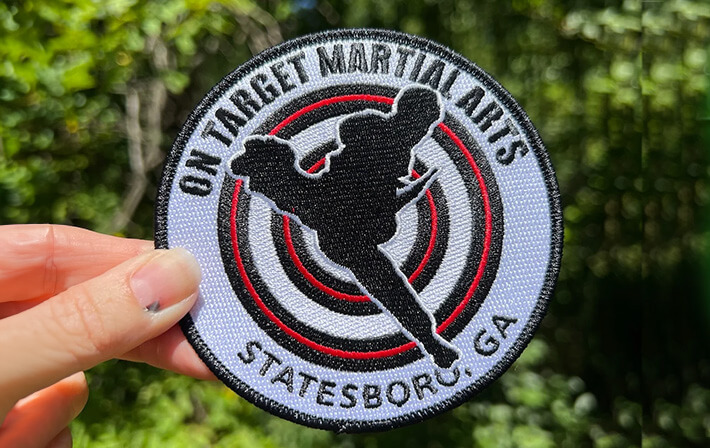 On Target Martial Arts embroidered patch, featuring a martial artist silhouette with a target design, customized for Statesboro, GA martial arts enthusiasts.